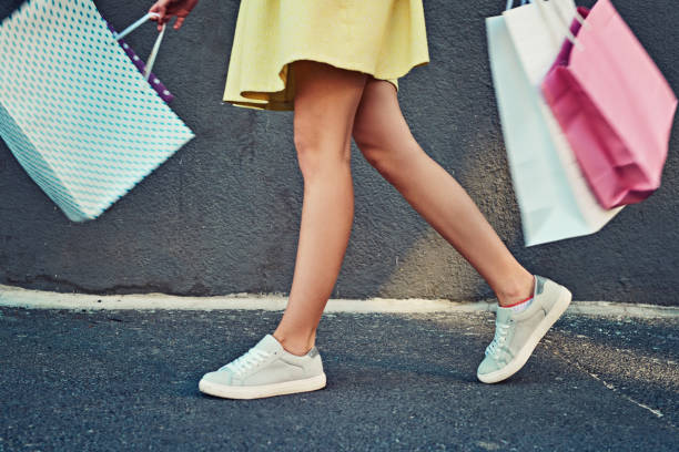Cropped Shot Of An Unrecognizable Woman On A Shopping Spree In The City